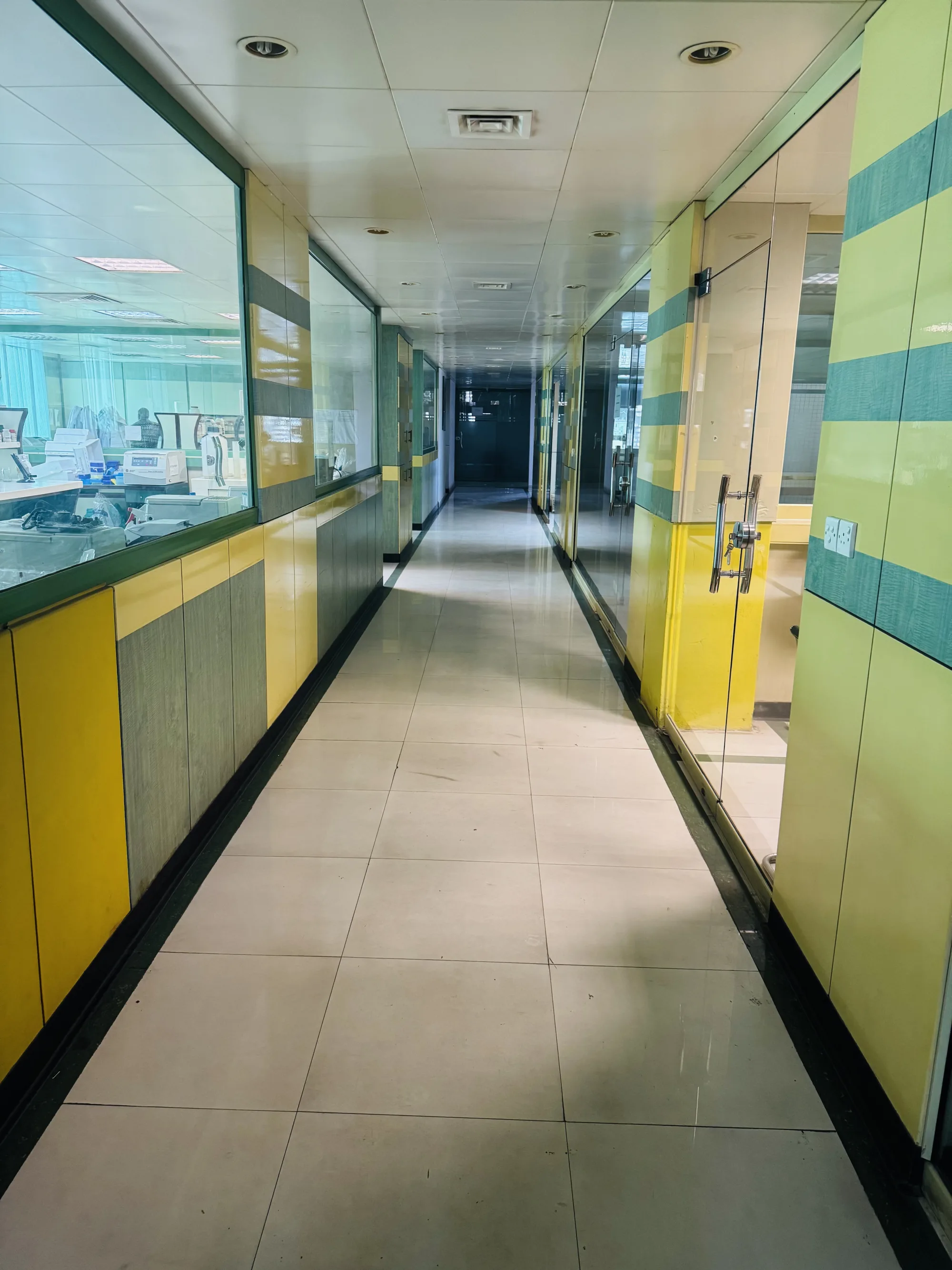 Glass-walled laboratory corridor at CEMB