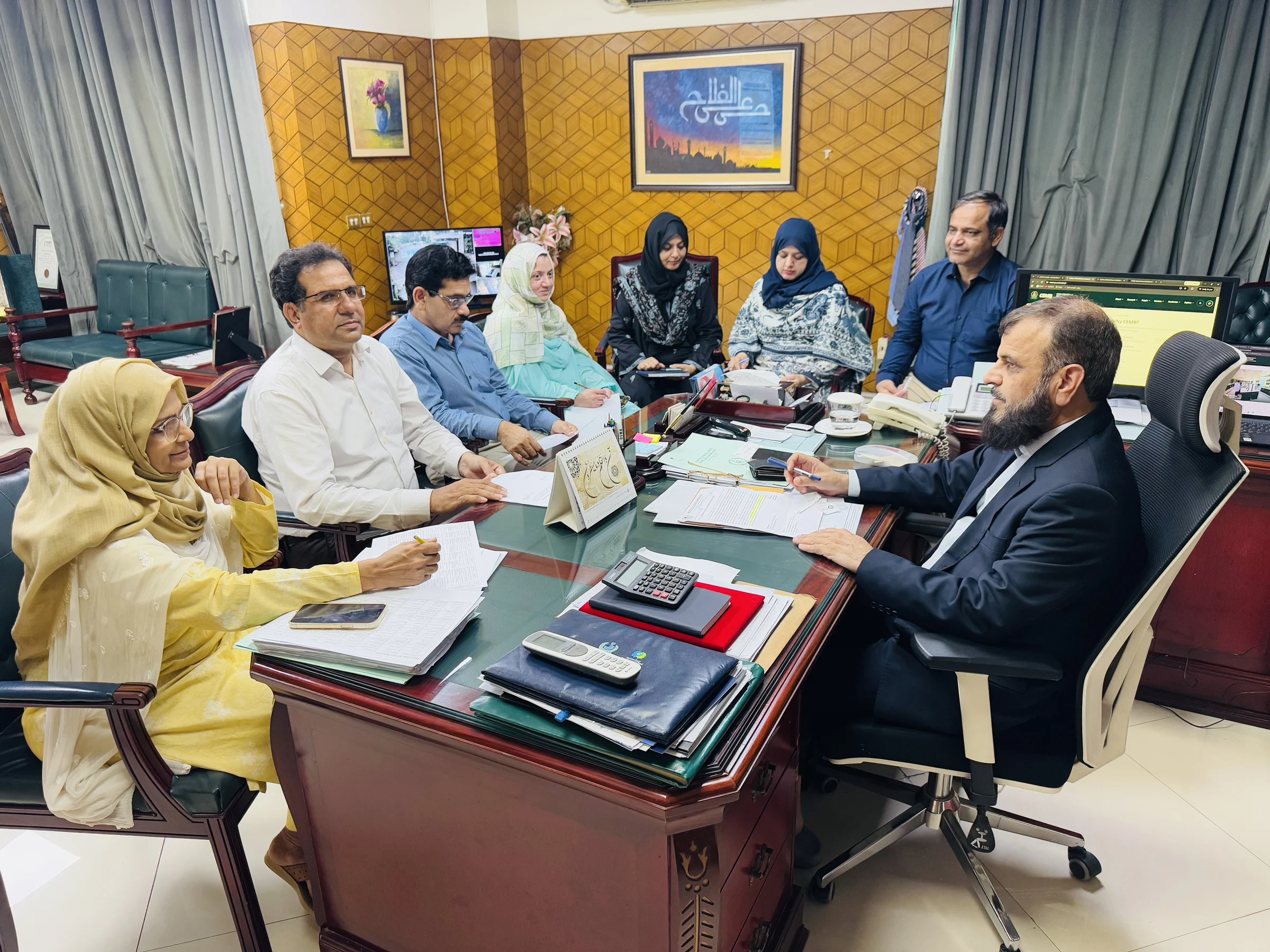 CEMB senior faculty in a meeting with the Director